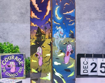 May include: A rectangular wooden lamp featuring colorful illustrations of Courage the Cowardly Dog. The panels depict the character in a desert landscape with a house and a ghost under a crescent moon. The design includes cut-out details.