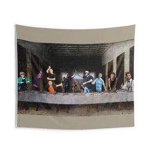 May include: A wall tapestry featuring a parody of The Last Supper, with a group of people in modern attire replacing the original figures. The scene is set in a dimly lit room with a long table.