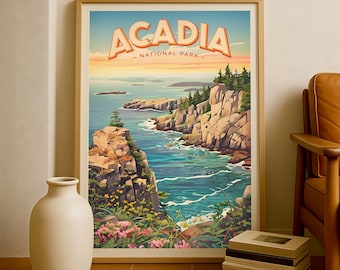 Puede incluir: Póster enmarcado del Parque Nacional Acadia. La impresión de estilo vintage presenta un paisaje costero con acantilados rocosos, agua turquesa y el nombre del parque en naranja. Un jarrón y libros en primer plano.