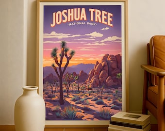 May include: A framed art print featuring a desert landscape with Joshua trees and rock formations under a sunset sky. The print has the words "JOSHUA TREE - NATIONAL PARK" in orange and white lettering.