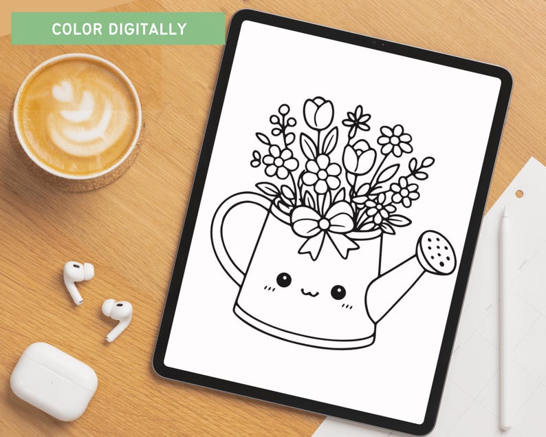 May include: A digital illustration of a watering can filled with flowers, displayed on a tablet. The watering can has a cute face and a bow. The text "COLOR DIGITALLY" is at the top left. A cup of coffee and earbuds are on the wooden surface.