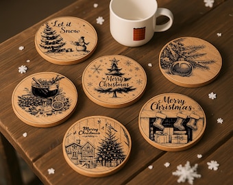 May include: Six round wooden Christmas coasters with engraved festive designs, including a snowman, Christmas tree, and fireplace. A white mug with a red square design is placed on a wooden table. The coasters are made of wood.