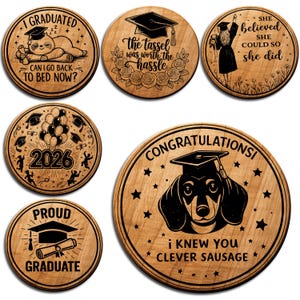 May include: Set of six wooden graduation coasters. Each coaster features a unique design with graduation-themed text and illustrations, including a sloth, mortarboard, and dachshund.