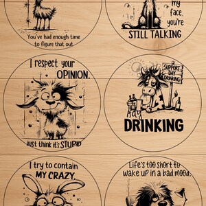 May include: Six round wooden signs with humorous illustrations and text. One sign features a goat with the text "It's not my fault you thought I was NORMAL." Another shows a cat with the text "STILL TALKING."