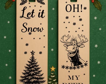 May include: Two wooden Christmas ornaments. One says "Let it Snow" with a Christmas tree graphic. The other says "OH! My Deer" with a cartoon moose graphic. Both have snowflake and star accents.
