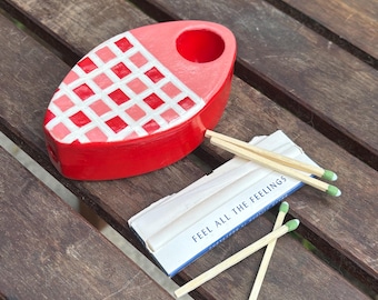 Pipa a cuadros rojos y rosas