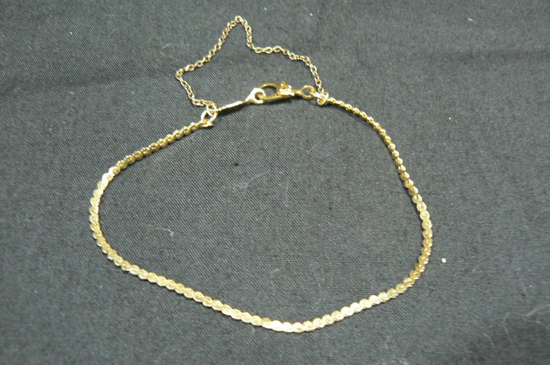Vintage Monet Gold Tone Flat Chain link Bracelet with a Safety Chain