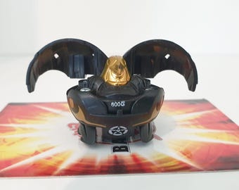 Bakugan Ravenoid 600g Bakugold Bronze Attack Gray Haos BATTLE BRAWLERS Rare - Fast SHIPPING