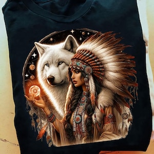 May include: A white wolf with blue eyes and a Native American woman wearing a headdress and holding a crystal ball. The image is set against a dark background with stars and planets.