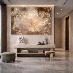 May include: A large rectangular wall art piece featuring a translucent, glowing white and gold flower with layered petals. The artwork is displayed above a long stone console table holding a white abstract sculpture, two small bowls, and a green plant.