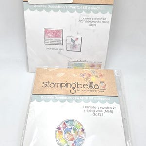 May include: Two packages of Danielle Donaldson's SWATCH KIT collection. One package is labeled "POST IT/THUMBNAIL (MINI) dd123" and the other "mixing well (MINI) dd121". Both packages feature the "Stamping Bella" logo.