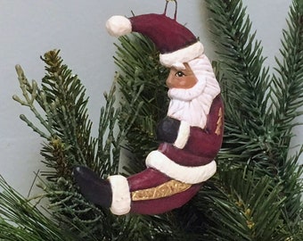 African American Ceramic Resting Woodland Santa Crescent Moon Christmas Ornament - Cranberry Red
