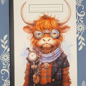 May include: A notebook cover featuring a cartoon illustration of a Highland cow wearing goggles, a scarf, and a plaid shirt. The cow is holding a pocket watch and has a steampunk aesthetic.