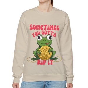 Women's sweatshirt with funny saying for crocheters and knitters. Frogging is a part of crocheting and knitting. Gift idea for crocheters and knitters. Knitting accessories. Crocheting accessories.