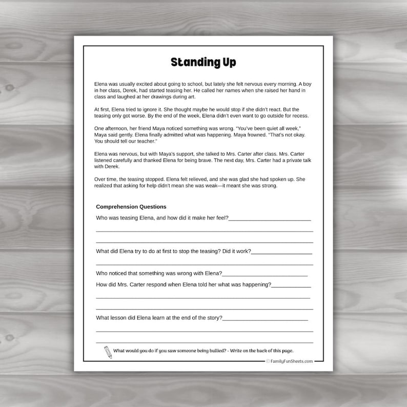 May include: A black and white worksheet titled "Standing Up" with comprehension questions about bullying. The text describes a story about a girl named Elena who is being teased at school. The worksheet is from FamilyFunSheets.com.