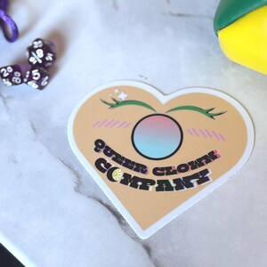 Pegatina de corazón de QCC