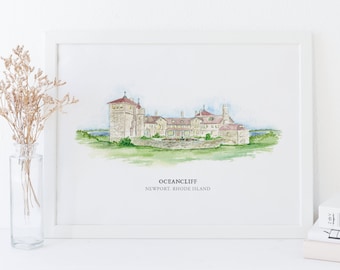 May include: A framed watercolor print of Oceancliff in Newport, Rhode Island. The artwork depicts a large building with a tower, set against a green landscape and blue water. The print is in a white frame.
