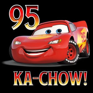 May include: Red cartoon racing car with a smiling face and the number 95 on the side. The car is saying "KA-CHOW!" in a red and yellow font.
