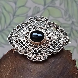 Vintage Sterling Silver Marcasite And Black Onyx Brooch