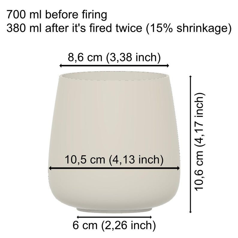 May include: A beige ceramic vase with a rounded base and a wide opening. The vase is 10.6 cm tall, 10.5 cm wide, and 6 cm in diameter at the base. The text indicates the vase shrinks after firing.