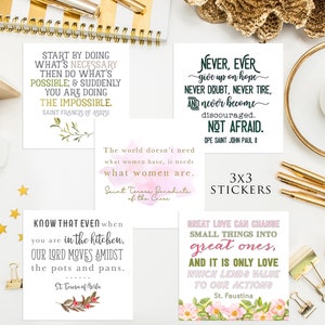 May include: Nine inspirational quote stickers with floral borders. The quotes are from Saint Francis of Assisi, Saint Teresa Benedicta of the Cross, Saint Teresa of Avila, Pope Saint John Paul II, and Saint Faustina. The stickers are arranged in a 3x3 grid on a white background.