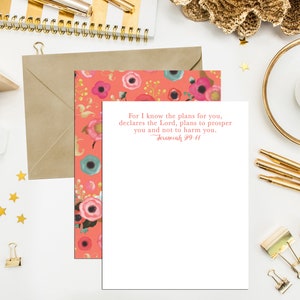 May include: A white card with a pink floral border and the text "For I know the plans for you, declares the Lord, plans to prosper you and not to harm you. Jeremiah 29:11"