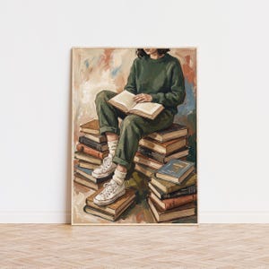 May include: An oil painting print depicting a person wearing a dark green sweater and matching trousers, sitting atop a large stack of books while reading an open book. The person wears white canvas sneakers and white socks against a textured background.