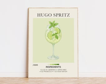 May include: A framed print featuring a Hugo Spritz cocktail illustration. The drink is in a stemmed glass, garnished with lime slices and mint. The print includes the cocktail name, ingredients, and a light green background.
