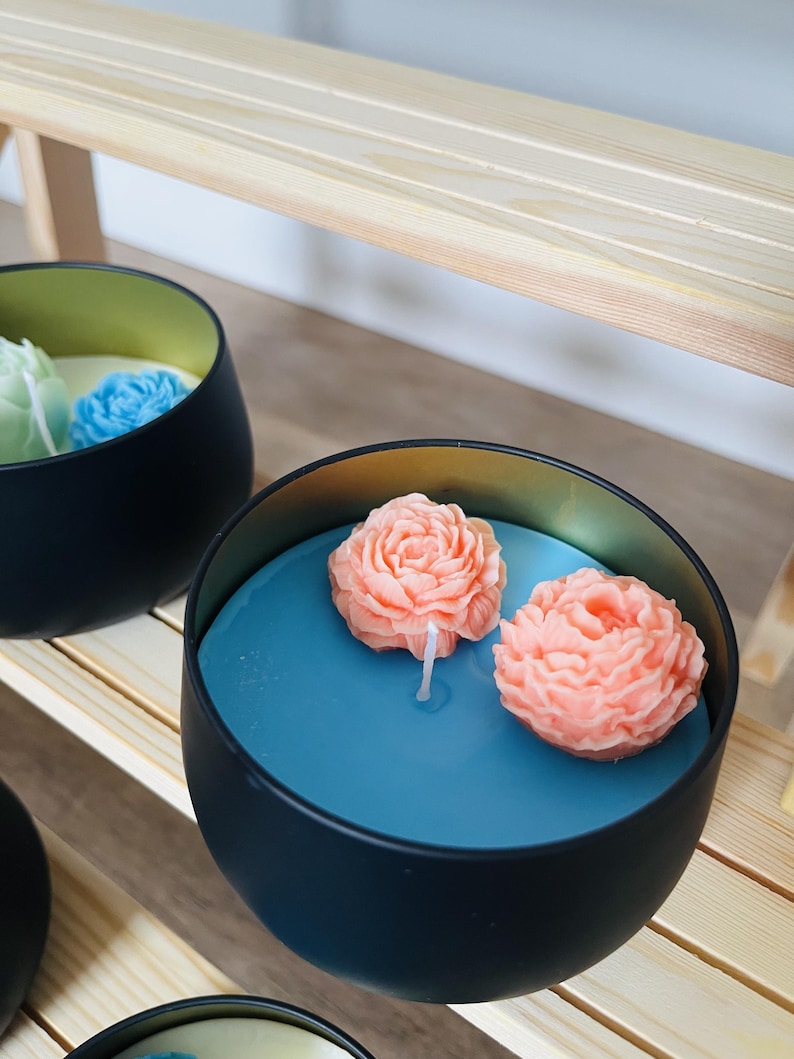 Coral flower candle bowl in deep teal soy wax