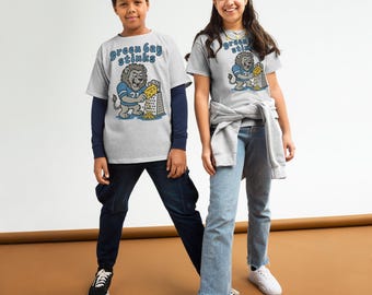 Camiseta infantil Detroit Lions: Leão engraçado destruindo queijo - Camiseta para dia de jogo