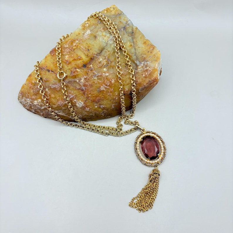 Vintage Avon Gold Tone Tassel Necklace with Pink Glass Stone, 1970s Retro Statement Pendant, Long Chain Jewelry