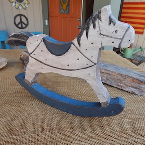 A Wooden Rocking Horse in a Nursery Stock Image - Image of childhood