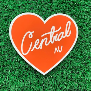 May include: Orange heart-shaped sticker with white text that says "Central NJ".