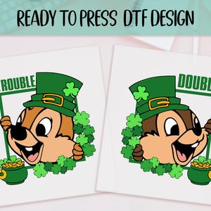 May include: Two DTF designs featuring a cartoon chipmunk wearing a green leprechaun hat and surrounded by shamrocks. One design says "Trouble" and the other says "Double". Each design includes a pot of gold.
