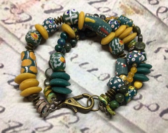 Triple strand krobo bead bracelet greens and golden yellows