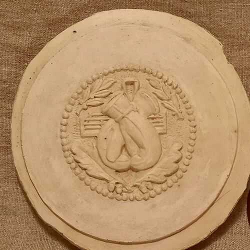 2 antique French boxing medallions. Plaster medallion of boxing gloves