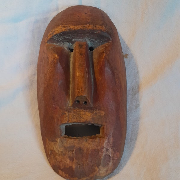 A beautiful wooden Eskimo mask from Alaska probably end of 19 century or early 20 century