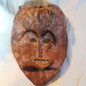 Beautiful and old Nepalese mask made from a old bark Nepal end of 19 century