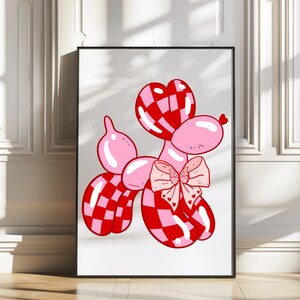 May include: A pink and red checkered balloon animal shaped like a poodle with a pink and white bow. The balloon animal is on a white background.
