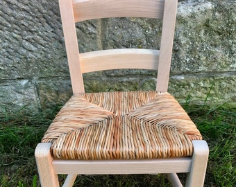 Plain wooden rush seat children's chair available raw to be painted by you or hand painted from the colour chart provided.