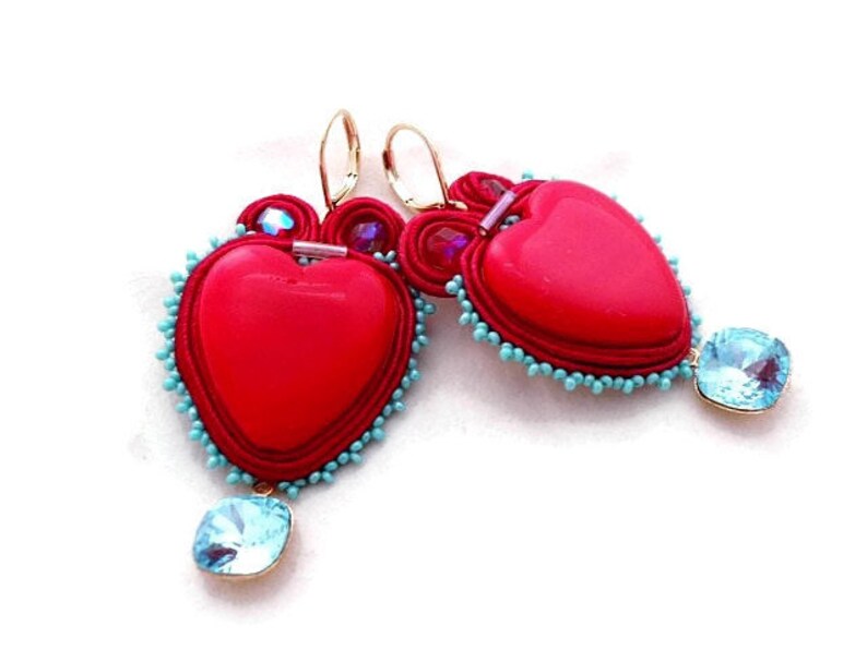 The Red Heart shaped & Crystal earrings product recommended by Mouna Marini on Improve Her Health.