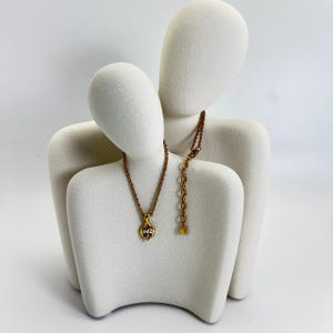 Vintage Nina Ricci Gold-Tone Necklace with Chain and Teardrop Pendant, Showcasing Elegant Design Perfect for Collectible Piece