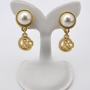 H&M MOSCHINO ゴールドメッキクリップイヤリング 【公式通販】