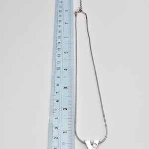 Valentino Vintage Silver-Tone V Logo Pendant Necklace with Adjustable Chain, Stylish Retro Designer Jewelry, Unisex Statement Accessory image 3