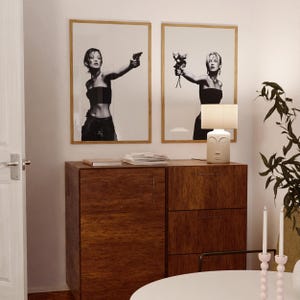 CHOICES Poster Set of 2 — black and white fashion wall art featuring a bold model holding a gun in one print and roses in the other, symbolizing duality, peace vs chaos. Minimalist chic and editorial, this set of 2 prints brings It-girl energy, femme fatale glamour, and main character vibes to any dorm room, apartment, or gallery wall. Perfect statement art for Gen Z, millennials, and modern cool-girl interiors.