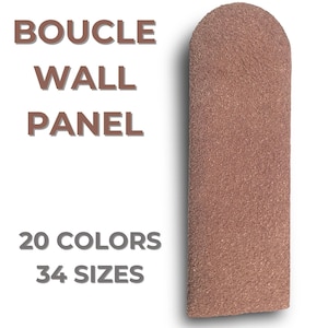 May include: A close-up of a brown boucle wall panel. The panel is textured and has a subtle sheen. The text "BOUCLE WALL PANEL 20 COLORS 34 SIZES" is printed on a white background.