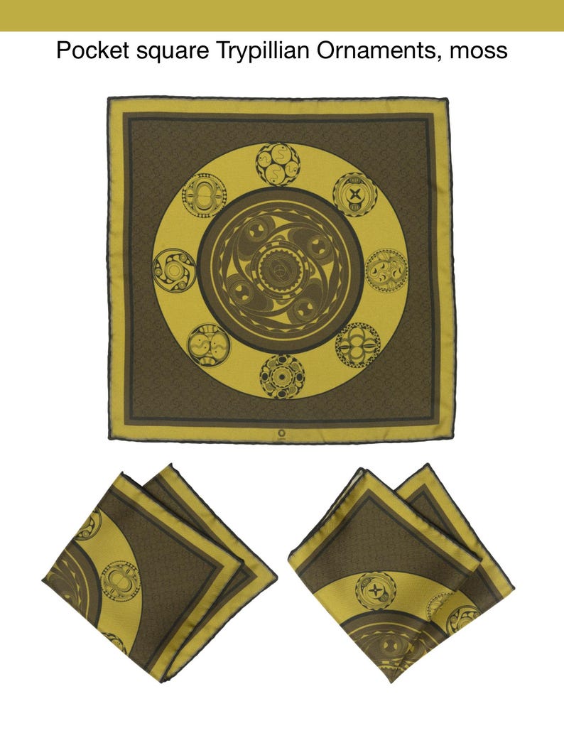 May include: A yellow pocket square with a brown geometric pattern. The pattern features a circle with smaller circles inside. The pocket square is folded into a triangle shape.