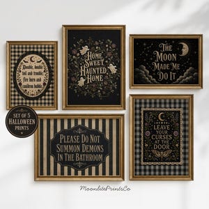 May include: A set of five framed Halloween wall art prints featuring black and gold designs. Text includes Double, double toil and trouble, Home Sweet Haunted Home, The Moon Made Me Do It, Please Do Not Summon Demons In The Bathroom, and Leave Your Curses At The Door.