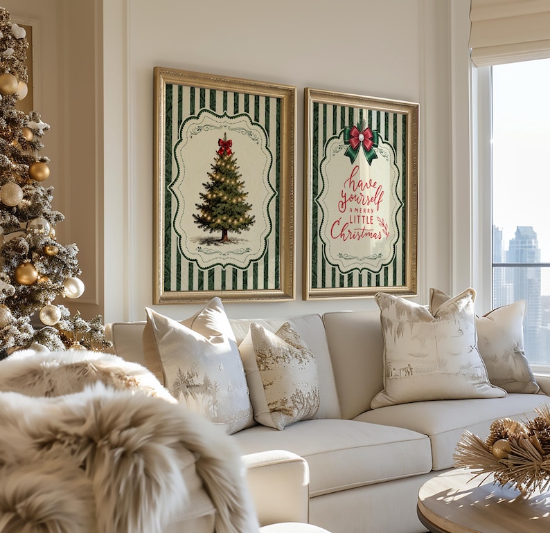 May include: Two framed rectangular wall art prints featuring a dark green and white vertical striped background. One print displays a decorated Christmas tree with a red bow, while the other features the text Have yourself a merry little Christmas.