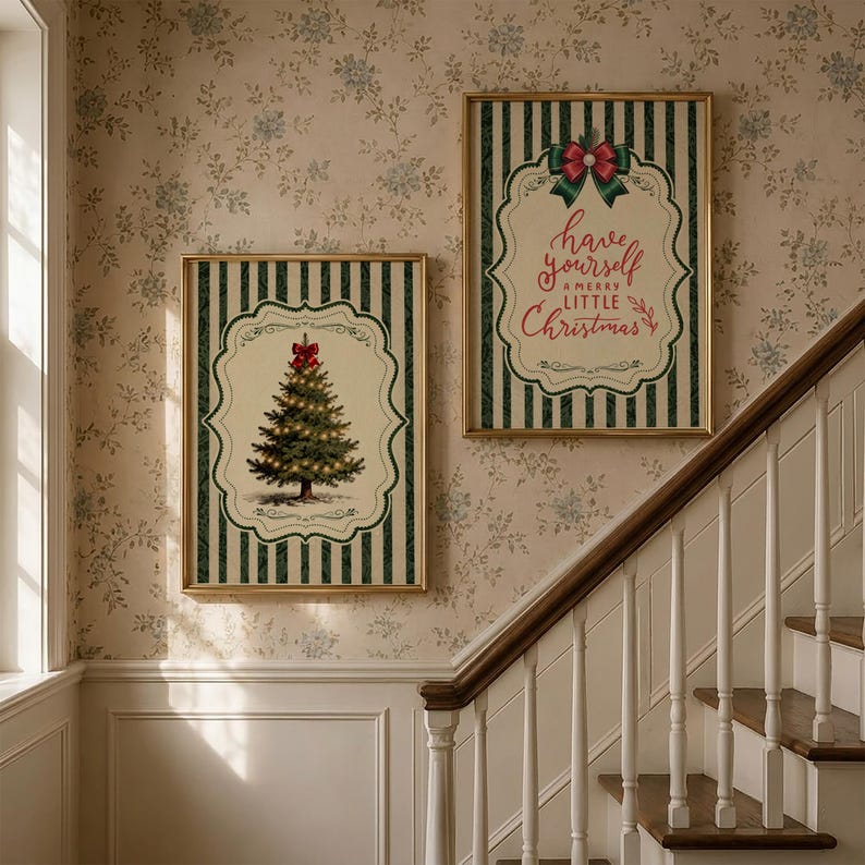 May include: Two rectangular framed wall art prints featuring a dark green and cream vertical striped background. One print displays a decorated Christmas tree with a red bow, while the other features the text Have yourself a merry little Christmas.